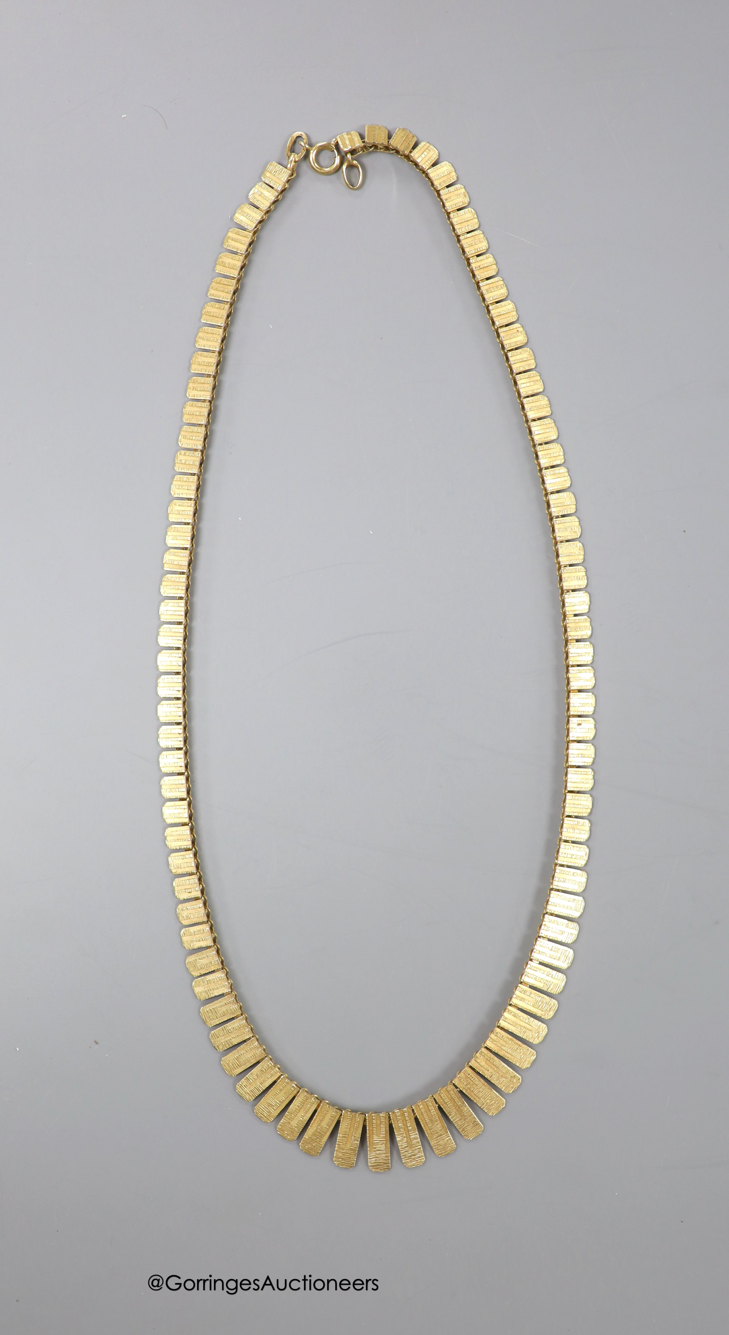 A modern 9ct gold fringe necklace, 42cm, 19.3 grams.